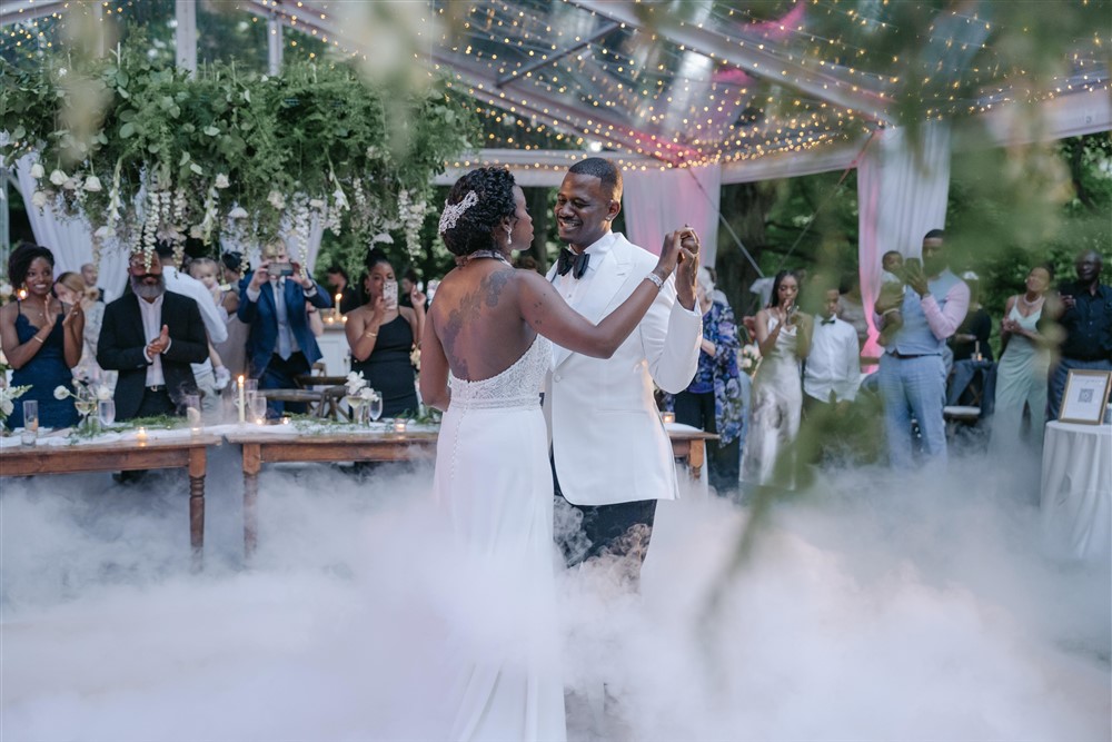 couple's first dance at a hudson valley wedding outdoor reception in a structure tent with lighting