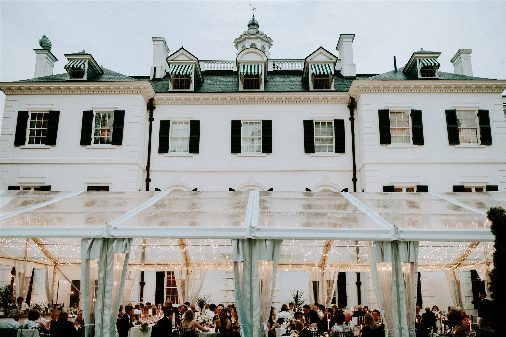 The Mount Edith Wharton House with clear tent and lighting for a wedding in the berkshires, ma